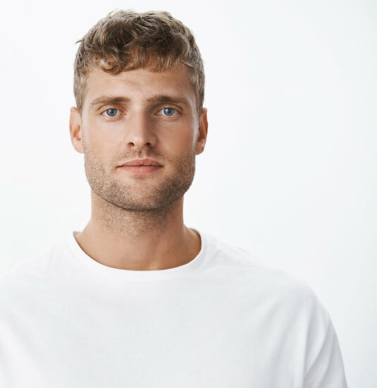 waist-up-shot-handsome-calm-blond-blue-eyed-guy-with-bristle-white-t-shirt-looking-front-with-relaxed-carefree-facial-expression-posing-gray-wall-looking-sincere-chill 1-1 waist-up-shot-handsome-calm-blond-blue-eyed-guy-with-bristle-white-t-shirt-looking-front-with-relaxed-carefree-facial-expression-posing-gray-wall-looking-sincere-chill 1-1